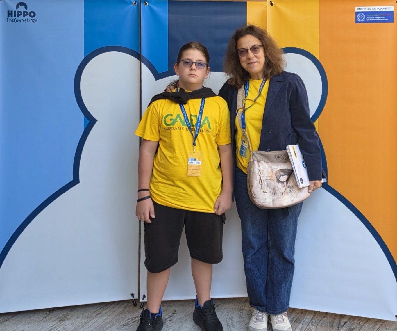 Владимир Ангелов и преподавателката му Галина Рупчанска на световния финал на HIPPO OLYMPIAD в Сполето, Италия